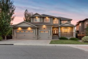 Beautiful home with a sunset in background